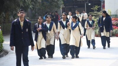 Students coming out after appearing for the Indian Certificate of Secondary Education (ICSE) Class 10th English examination at St. Xavier's High School in Patna. (Santosh Kumar)