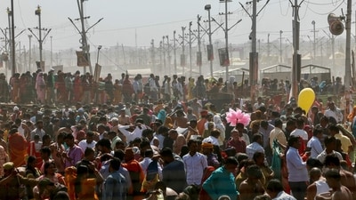 Hindu pilgrims gather to take a holy dip on the banks of the river Ganges during the ongoing Maha Kumbh Mela festival in Prayagraj on February 14, 2025. (AFP)
