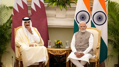 Qatar's Emir Sheikh Tamim bin Hamad Al-Thani and Indian Prime Minister Narendra Modi, right, preside over signing of agreements in New Delhi,India, Tuesday, (AP Photo/Manish Swarup) (AP)