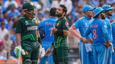 Pakistan's Babar Azam and Mohammad Rizwan wait for the decision of review as Indian players look on during the ICC Men's Cricket World Cup 2023 match between India and Pakistan (PTI) Pakistan's Babar Azam and Mohammad Rizwan wait for the decision of review as Indian players look on during the ICC Men's Cricket World Cup 2023 match between India and Pakistan (PTI)