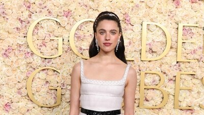 Margaret Qualley of the Substance fame, attended walked the Golden Globes red carpet in a custom-made white Chanel dress. the tulle dress featured a sweetheart neckline with a black shiny bow added to the waist. However, the tulle skirt was drab. (Amy Sussman/Getty Images) Margaret Qualley of the Substance fame, attended walked the Golden Globes red carpet in a custom-made white Chanel dress. the tulle dress featured a sweetheart neckline with a black shiny bow added to the waist. However, the tulle skirt was drab. (Amy Sussman/Getty Images)