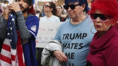 NORTH HOLLYWOOD, CALIFORNIA - FEBRUARY 17: Protesters rally against the Trump administration during a "Not My President's Day" protest on February 17, 2025 in North Hollywood, California. Protests are being held in cities across the nation on Presidents' Day against what the organizers say are "the anti-democratic and illegal actions of the Trump administration." Mario Tama/Getty Images/AFP (Photo by MARIO TAMA / GETTY IMAGES NORTH AMERICA / Getty Images via AFP) (Getty Images via AFP) NORTH HOLLYWOOD, CALIFORNIA - FEBRUARY 17: Protesters rally against the Trump administration during a "Not My President's Day" protest on February 17, 2025 in North Hollywood, California. Protests are being held in cities across the nation on Presidents' Day against what the organizers say are "the anti-democratic and illegal actions of the Trump administration." Mario Tama/Getty Images/AFP (Photo by MARIO TAMA / GETTY IMAGES NORTH AMERICA / Getty Images via AFP) (Getty Images via AFP)
