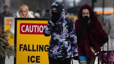 CHICAGO, ILLINOIS - FEBRUARY 17: People walk along Michigan Avenue as temperatures hovered in the single-digits on February 17, 2025 in Chicago, Illinois. Temperatures are expected to remain below normal in the city for the remainder of the week. Scott Olson/Getty Images/AFP (Photo by SCOTT OLSON / GETTY IMAGES NORTH AMERICA / Getty Images via AFP) (Getty Images via AFP) CHICAGO, ILLINOIS - FEBRUARY 17: People walk along Michigan Avenue as temperatures hovered in the single-digits on February 17, 2025 in Chicago, Illinois. Temperatures are expected to remain below normal in the city for the remainder of the week. Scott Olson/Getty Images/AFP (Photo by SCOTT OLSON / GETTY IMAGES NORTH AMERICA / Getty Images via AFP) (Getty Images via AFP)