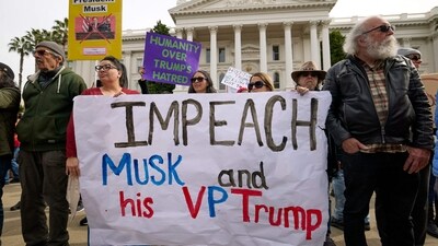 Demonstrators rally against US President Donald Trump during a protest, part of the �50 States 50 Protests 1 Day� movement, to mark President's Day on February 17, 2025 in Sacramento, California. (Photo by FRED GREAVES / AFP) (AFP) Demonstrators rally against US President Donald Trump during a protest, part of the �50 States 50 Protests 1 Day� movement, to mark President's Day on February 17, 2025 in Sacramento, California. (Photo by FRED GREAVES / AFP) (AFP)