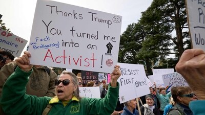 Demonstrators rally against US President Donald Trump during a protest, part of the �50 States 50 Protests 1 Day� movement, to mark President's Day on February 17, 2025 in Sacramento, California. (Photo by FRED GREAVES / AFP) (AFP) Demonstrators rally against US President Donald Trump during a protest, part of the �50 States 50 Protests 1 Day� movement, to mark President's Day on February 17, 2025 in Sacramento, California. (Photo by FRED GREAVES / AFP) (AFP)