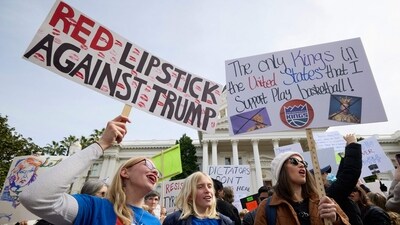 Demonstrators rally against US President Donald Trump during a protest, part of the �50 States 50 Protests 1 Day� movement, to mark President's Day on February 17, 2025 in Sacramento, California. (Photo by FRED GREAVES / AFP) (AFP) Demonstrators rally against US President Donald Trump during a protest, part of the �50 States 50 Protests 1 Day� movement, to mark President's Day on February 17, 2025 in Sacramento, California. (Photo by FRED GREAVES / AFP) (AFP)