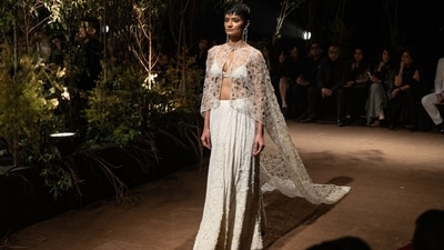 The collection unfolded like a dream, featuring a striking interplay of structure and fluidity.