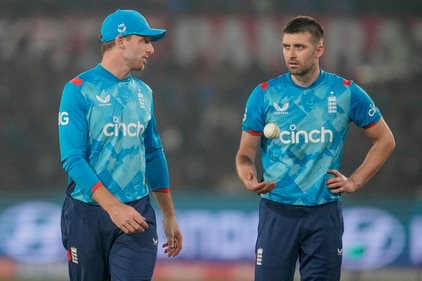 England's captain Jos Buttler, left, talks to Mark Wood during the second one day international cricket match between India and England in Cuttack, India, Sunday, Feb. 9, 2025. (AP Photo/Rafiq Maqbool) (AP) England's captain Jos Buttler, left, talks to Mark Wood during the second one day international cricket match between India and England in Cuttack, India, Sunday, Feb. 9, 2025. (AP Photo/Rafiq Maqbool) (AP)