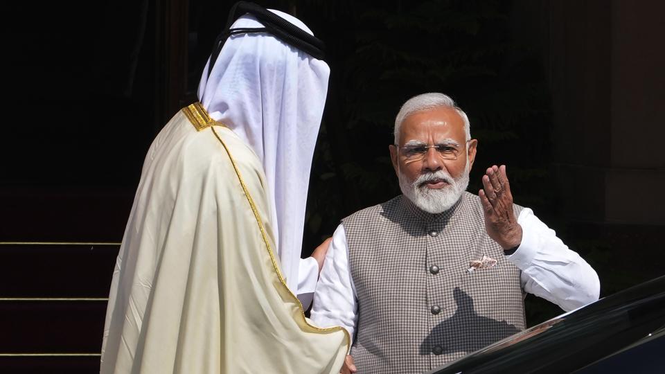 Prime Minister Narendra Modi, right, welcomes Qatar’s Amir Sheikh Tamim bin Hamad Al-Thani for delegation level meeting in New Delhi on Tuesday. (AP) Prime Minister Narendra Modi, right, welcomes Qatar’s Amir Sheikh Tamim bin Hamad Al-Thani for delegation level meeting in New Delhi on Tuesday. (AP)