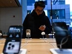 A man tests an iPhone 16 in an Apple store. Apple has been diversifying production beyond China, most recently beginning production of its AirPods wireless earphones on a trial basis in India. A man tests an iPhone 16 in an Apple store. Apple has been diversifying production beyond China, most recently beginning production of its AirPods wireless earphones on a trial basis in India.