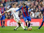 ionel Messi, center right, escapes Cristiano Ronaldo during the Spanish La Liga soccer match between FC Barcelona and Real Madrid at the Camp Nou in Barcelona, Spain, Saturday, Dec. 3, 2016. ionel Messi, center right, escapes Cristiano Ronaldo during the Spanish La Liga soccer match between FC Barcelona and Real Madrid at the Camp Nou in Barcelona, Spain, Saturday, Dec. 3, 2016.