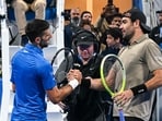 Italy's Matteo Berettin shakes hands with Serbia's Novak Djokovic after their men's singles match at the ATP Qatar Open tennis tournament in Doha on February 18, 2025 Italy's Matteo Berettin shakes hands with Serbia's Novak Djokovic after their men's singles match at the ATP Qatar Open tennis tournament in Doha on February 18, 2025