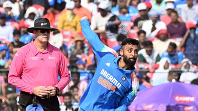 Cuttack, Feb 09 (ANI): India's Varun Chakravarthy in action during the 2nd ODI match against England, at Barabati Stadium in Cuttack on Sunday. (ANI Photo) (Bibhash Lodh)