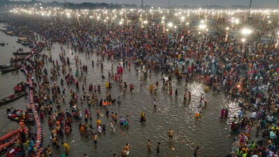 Devotees take a holy dip at the Sangam during the ongoing Mahakumbh Mela 2025 in Prayagraj on Tuesday (PTI) Devotees take a holy dip at the Sangam during the ongoing Mahakumbh Mela 2025 in Prayagraj on Tuesday (PTI)
