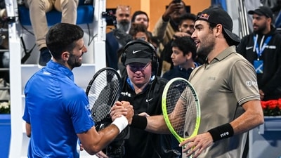 Italy's Matteo Berettin shakes hands with Serbia's Novak Djokovic after their men's singles match at the ATP Qatar Open tennis tournament in Doha on February 18, 2025 (AFP) Italy's Matteo Berettin shakes hands with Serbia's Novak Djokovic after their men's singles match at the ATP Qatar Open tennis tournament in Doha on February 18, 2025 (AFP)