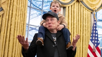 Tesla CEO Elon Musk with his son in the Oval Office of the White House in Washington, DC. (AFP)