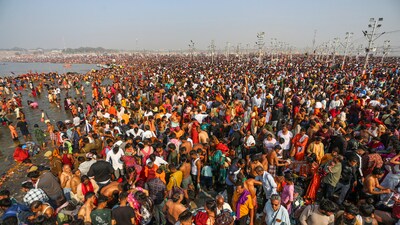 Devotees take a holy dip in the Ganga river during the ongoing Maha Kumbh Mela festival, in Prayagraj, Wednesday, Feb. 19, 2025. (PTI)