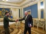 U.S. Special Envoy for Ukraine and Russia Keith Kellogg, right, and Ukraine's President Volodymyr Zelenskyy shake hands during their meeting in Kyiv, Ukraine.