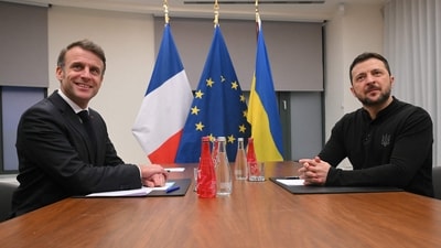 FILE: France's President Emmanuel Macron (L) and Ukraine's President Volodymyr Zelensky pose before a meeting in Brussels on December 18, 2024. (AFP) FILE: France's President Emmanuel Macron (L) and Ukraine's President Volodymyr Zelensky pose before a meeting in Brussels on December 18, 2024. (AFP)