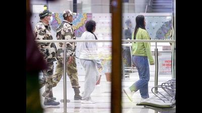 CISF personnel escort Indian citizens deported from the US at Sri Guru Ram Das Jee International Airport in Amritsar. (ANI) CISF personnel escort Indian citizens deported from the US at Sri Guru Ram Das Jee International Airport in Amritsar. (ANI)