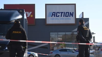 Police officers stand guard in a shopping area in Hradec Kralove, Czech Republic, at the site where two women have died in a knife attack, Thursday, Feb 20, 2025. (AP) Police officers stand guard in a shopping area in Hradec Kralove, Czech Republic, at the site where two women have died in a knife attack, Thursday, Feb 20, 2025. (AP)