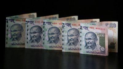 FILE PHOTO: Indian Rupee notes are seen in this picture illustration taken in Mumbai June 12, 2013. REUTERS/Vivek Prakash/File Photo (Reuters)
