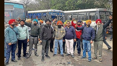 Outsourced Punjab Roadways employees staging a demonstration over salary delays at the ISBT in Ludhiana on Thursday. (Gurpreet Singh) Outsourced Punjab Roadways employees staging a demonstration over salary delays at the ISBT in Ludhiana on Thursday. (Gurpreet Singh)