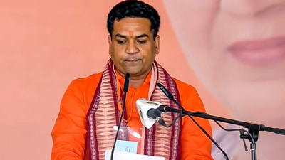 BJP MLA Kapil Mishra took the oath as a Minister during the Delhi government's swearing-in ceremony at Ramlila Maidan in New Delhi. (PTI) BJP MLA Kapil Mishra took the oath as a Minister during the Delhi government's swearing-in ceremony at Ramlila Maidan in New Delhi. (PTI)