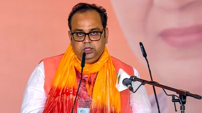 BJP MLA Pankaj Kumar Singh took oath as a minister during the Delhi government's swearing-in ceremony at Ramlila Maidan in New Delhi. (PTI) BJP MLA Pankaj Kumar Singh took oath as a minister during the Delhi government's swearing-in ceremony at Ramlila Maidan in New Delhi. (PTI)