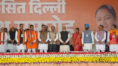 Prime Minister Narendra Modi, Union minsters Rajnath Singh and Amit Shah and Lt Governor VK Saxena with newly sworn-in Delhi Chief Minister Rekha Gupta and other ministers after the oath ceremony, in New Delhi, Thursday, Feb. 20, 2025. (PTI) Prime Minister Narendra Modi, Union minsters Rajnath Singh and Amit Shah and Lt Governor VK Saxena with newly sworn-in Delhi Chief Minister Rekha Gupta and other ministers after the oath ceremony, in New Delhi, Thursday, Feb. 20, 2025. (PTI)