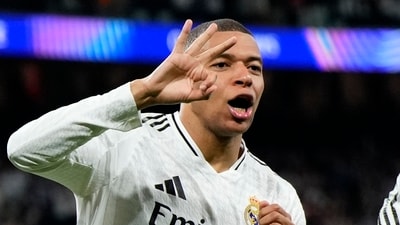 Real Madrid's Kylian Mbappe celebrates his third goal. (AP)