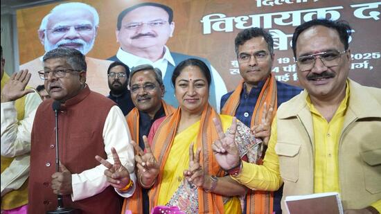 Chief minister-designate Rekha Gupta with BJP leaders. (PTI)