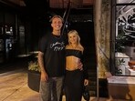 Carson Beck poses for a photo with his girlfriend.