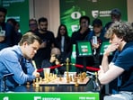 Magnus Carlsen and Hans Niemann during a match. Magnus Carlsen and Hans Niemann during a match.