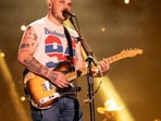 Country star Zach Bryan was filmed using a homophobic slur during a confrontation at a NYC bar, escalating after he lost a pool game.
(Photo by Amy Harris/Invision/AP)