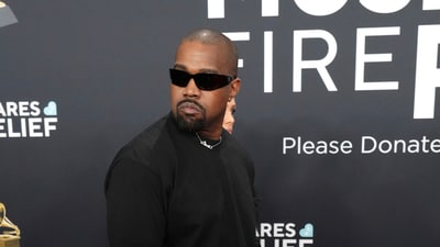Kanye West's former assistant, Lauren Pisciotta, has filed a lawsuit alleging sexual harassment and inappropriate behaviour during her employment in 2021. West denies the allegations, claiming Pisciotta is attempting to extort him. (Jordan Strauss/Invision/AP)