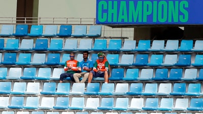 India fans sit under the shade in an empty stand during the match against Bangladesh (Surjeet Yadav) India fans sit under the shade in an empty stand during the match against Bangladesh (Surjeet Yadav)