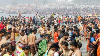 Devotees take a dip at Triveni Sangam during the ongoing Maha Kumbh 2025, in Prayagraj on Thursday. (ANI Photo) (Ravi Prakash)