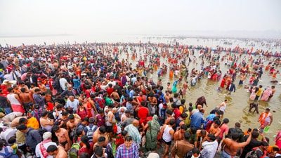 Devotees take a dip at Triveni Sangam during the ongoing Maha Kumbh 2025, in Prayagraj on Thursday. (ANI) Devotees take a dip at Triveni Sangam during the ongoing Maha Kumbh 2025, in Prayagraj on Thursday. (ANI)