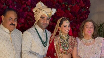 Aadar Jain and Alekha Advani posing with his parents after their wedding. Pic: Ashutosh Rai