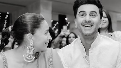 Alia Bhatt and Ranbir Kapoor were caught in a candid moment at Aadar Jain's pre-wedding. Alia Bhatt and Ranbir Kapoor were caught in a candid moment at Aadar Jain's pre-wedding.