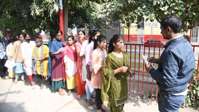 Officials verify the details of students before appearing for the BSEB Class 10 exam in Patna (Santosh Kumar) Officials verify the details of students before appearing for the BSEB Class 10 exam in Patna (Santosh Kumar)