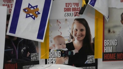 A poster shows Shiri Bibas, who was kidnapped to Gaza with her husband and two young sons on Oct. 7, 2023, in Jerusalem, Friday, Feb. 21, 2025. (AP Photo/Mahmoud Illean) (AP) A poster shows Shiri Bibas, who was kidnapped to Gaza with her husband and two young sons on Oct. 7, 2023, in Jerusalem, Friday, Feb. 21, 2025. (AP Photo/Mahmoud Illean) (AP)