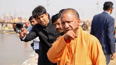 Uttar Pradesh chief minister Yogi Adityanath with officials during a visit to Sangam at the ongoing Maha Kumbh Mela in Prayagraj. (PTI) Uttar Pradesh chief minister Yogi Adityanath with officials during a visit to Sangam at the ongoing Maha Kumbh Mela in Prayagraj. (PTI)