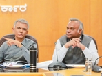 Krishna Byre Gowda (L), Priyank Kharge (R).