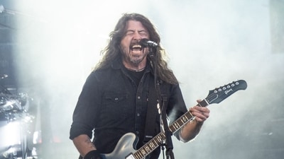 The identity of the LA-based woman caught in a cheating scandal with Dave Grohl last summer has been revealed. (AFP) The identity of the LA-based woman caught in a cheating scandal with Dave Grohl last summer has been revealed. (AFP)