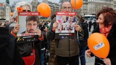 People hold portrait placards reading "kidnapped on October 7" during a gathering in tribute to Israeli hostages. (GEOFFROY VAN DER HASSELT / AFP) People hold portrait placards reading "kidnapped on October 7" during a gathering in tribute to Israeli hostages. (GEOFFROY VAN DER HASSELT / AFP)