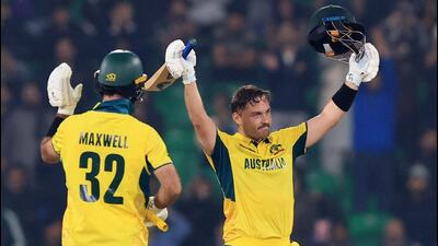 Josh Inglis celebrates after reaching his century against England during their Champions Trophy match on Saturday. (REUTERS) Josh Inglis celebrates after reaching his century against England during their Champions Trophy match on Saturday. (REUTERS)