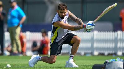 Virat Kohli plays a shot during a practice session at the ICC Academy ground in Dubai. (AFP) Virat Kohli plays a shot during a practice session at the ICC Academy ground in Dubai. (AFP)