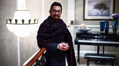 Aamir Khan poses for a portrait inside a hotel during an interview with AFP in London on December 3, 2024. (Photo by HENRY NICHOLLS / AFP) (AFP) Aamir Khan poses for a portrait inside a hotel during an interview with AFP in London on December 3, 2024. (Photo by HENRY NICHOLLS / AFP) (AFP)